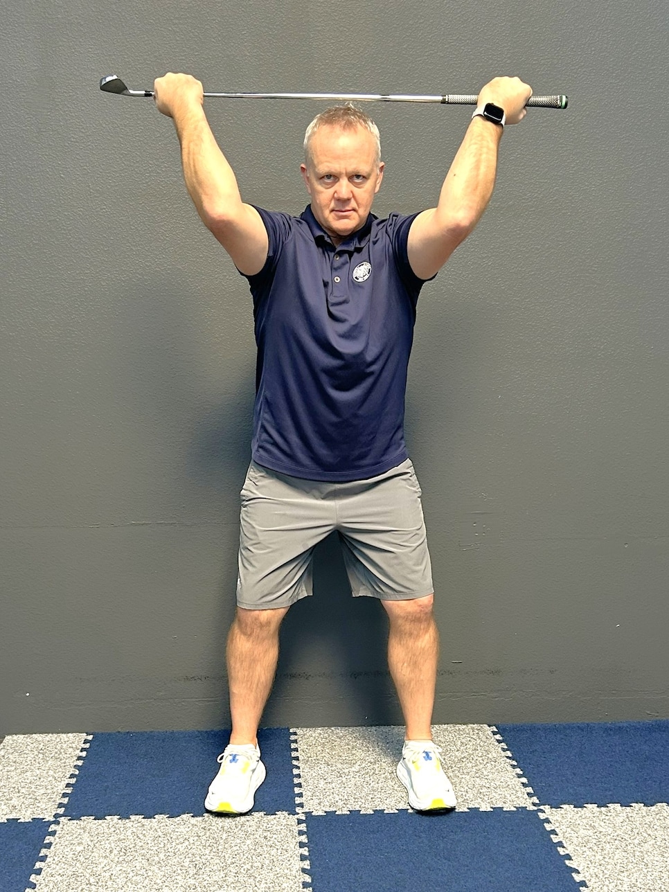 /content/dam/images/golfdigest/fullset/fitness-2024/Hansen External Shoulder Squeeze 2.JPEG